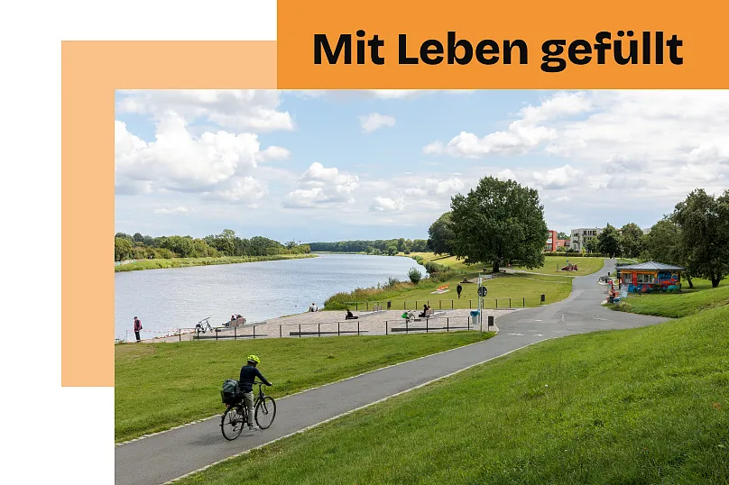 Das Foto zeigt den Werdersee im Bereich Deichschart mit Uferanlage und Kiosk