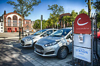 Zu sehen ist eine Car-Sharing Station des Anbieters Cambio.